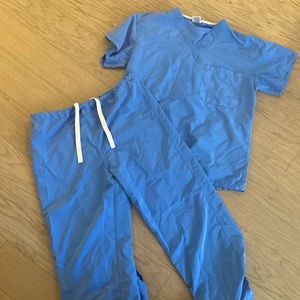 Size Small baby blue Merlin’s Scrub set